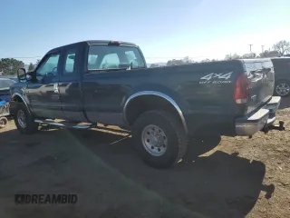 2001 Ford Super Duty F-250 XL with VIN 1FTNX21F21EB60806, listed as a Copart auction lot 42493565 with 142,977 mi miles and Salvage Title. Bid and sale history available at carsss.com. Image 2.