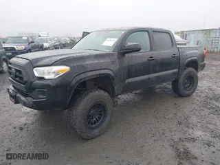 2022 Toyota Tacoma 4WD SR with VIN 3TMCZ5ANXNM490638, listed as a IAAI auction lot 41286719 with 52,328 mi miles. Bid and sale history available at carsss.com. Image 18.