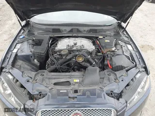 2015 Jaguar XF V6 Portfolio with VIN SAJWJ0FF5F8U67140, listed as a IAAI auction lot 41967522 with 68,000 mi miles. Bid and sale history available at carsss.com. Image 10.