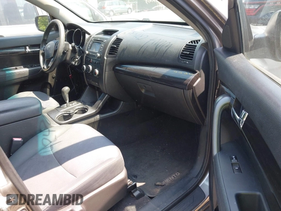2013 Kia Sorento LX with VIN 5XYKT3A64DG363258, listed as a IAAI auction lot 42490986 with 215,694 mi miles and . Bid and sale history available at DreamBid. Image 5.