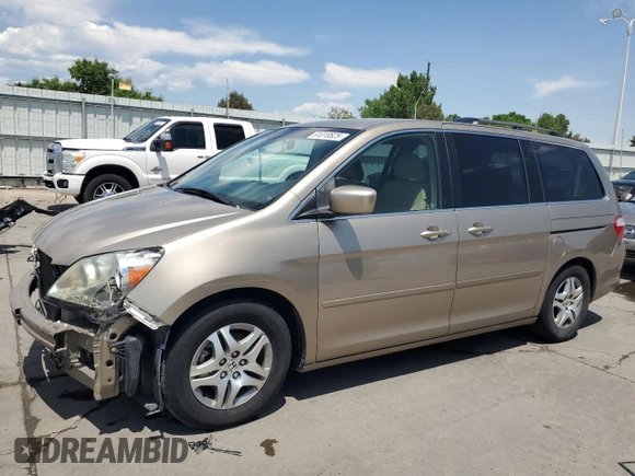2006 Honda Odyssey EX with VIN 5FNRL38426B401762, listed as a Copart auction lot 61018525 with 145,370 mi miles and Salvage title. Bid and sale history available at DreamBid. Image 1.
