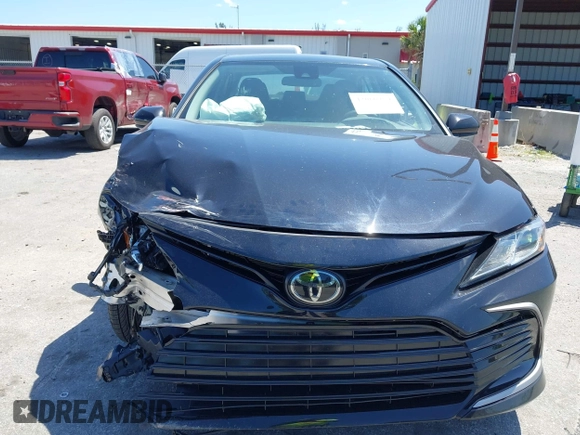 2023 Toyota Camry LE z VIN 4T1C11AK2PU120803, wystawiony jako IAAI lot #42060384 z przebiegiem 38 897 mil mil oraz . Historia ofert i sprzedaży dostępna na DreamBid. Obrazek 13.