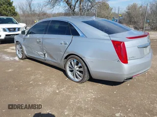 2013 Cadillac XTS Luxury with VIN 2G61R5S34D9233991, listed as a IAAI auction lot 41825533 with 152,706 mi miles. Bid and sale history available at carsss.com. Image 3.