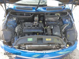 2006 MINI Hardtop with VIN WMWRC33596TJ75357, listed as a IAAI auction lot 42016124 with Not Provided miles and . Bid and sale history available at DreamBid. Image 10.