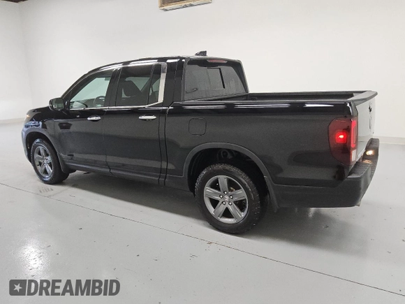 2023 Honda Ridgeline RTL-E with VIN 5FPYK3F79PB038896, listed as a Copart auction lot 58401225 with 23,531 mi miles and Clean title. Bid and sale history available at DreamBid. Image 2.