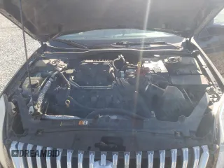 2010 Mercury Milan Premier z VIN 3MEHM0JG6AR615834, wystawiony jako Copart lot #53944795 z przebiegiem 123 436 mil mil oraz Szkoda całkowita • Salvage title. Historia ofert i sprzedaży dostępna na DreamBid. Obrazek 11.