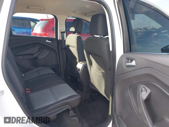 2017 Ford Escape SE z VIN 1FMCU0GD4HUC98899, wystawiony jako IAAI lot #41633762 z przebiegiem 72 245 mil mil oraz . Historia ofert i sprzedaży dostępna na DreamBid. Obrazek 8.