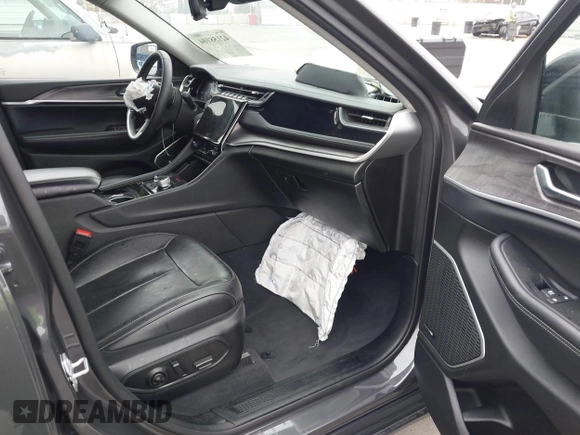 2022 Jeep Grand Cherokee with VIN 1C4RJYB68N8748802, listed as a IAAI auction lot 42158104 with 28,227 mi miles and . Bid and sale history available at DreamBid. Image 5.