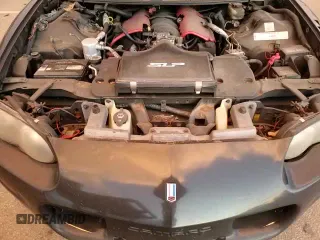 2002 Chevrolet Camaro Z28 z VIN 2G1FP22G422157049, wystawiony jako Copart lot #81936084 z przebiegiem 301 778 mil mil oraz Szkoda całkowita • Salvage title. Historia ofert i sprzedaży dostępna na DreamBid. Obrazek 13.