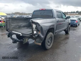 2018 Toyota Tundra 4WD SR5 with VIN 5TFDY5F14JX768998, listed as a IAAI auction lot 41593799 with 146,673 mi miles. Bid and sale history available at carsss.com. Image 4.