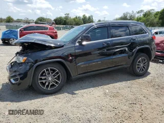 2018 Jeep Grand Cherokee Laredo E with VIN 1C4RJEAG1JC354221, listed as a Copart auction lot 58002715 with 108,223 mi miles and Salvage title. Bid and sale history available at DreamBid. Image 1.