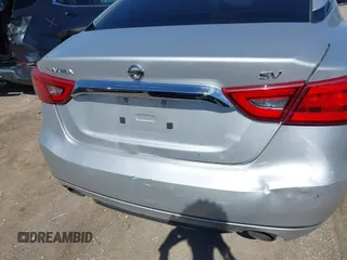 2016 Nissan Maxima Platinum with VIN 1N4AA6AP1GC400986, listed as a IAAI auction lot 41603612 with 171,784 mi miles and . Bid and sale history available at DreamBid. Image 6.