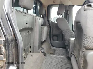 2009 Nissan Frontier SE with VIN 1N6AD06W69C400688, listed as a Copart auction lot 85140904 with 165,558 mi miles and Salvage title. Bid and sale history available at DreamBid. Image 11.