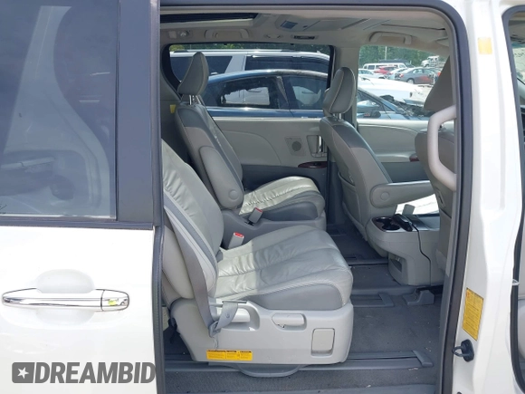 2011 Toyota Sienna XLE AAS with VIN 5TDYK3DC0BS008439, listed as a IAAI auction lot 42292552 with 115,162 mi miles and . Bid and sale history available at DreamBid. Image 8.