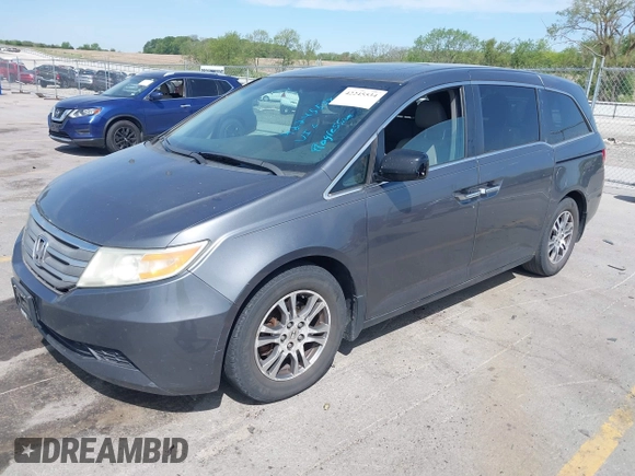 2011 Honda Odyssey EX-L with VIN 5FNRL5H69BB092752, listed as a IAAI auction lot 42245534 with 142,718 mi miles and . Bid and sale history available at DreamBid. Image 2.
