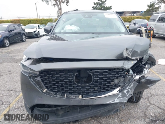 2022 Mazda CX-5 2.5 S Premium Plus Package with VIN JM3KFBEM1N0523105, listed as a IAAI auction lot 41730897 with 64,008 mi miles. Bid and sale history available at carsss.com. Image 12.
