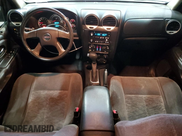 2005 GMC Envoy SLT with VIN 1GKDT13S652197929, listed as a Copart auction lot 42104855 with 228,515 mi miles and Salvage Title. Bid and sale history available at carsss.com. Image 8.