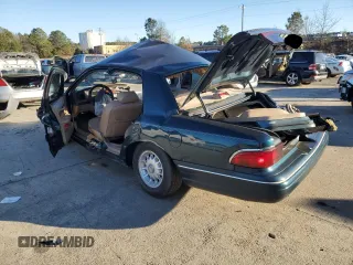 1997 Mercury Grand Marquis LS with VIN 2MELM75W2VX638121, listed as a Copart auction lot 88725135 with 135,475 mi miles and Salvage Title. Bid and sale history available at DreamBid. Image 2.