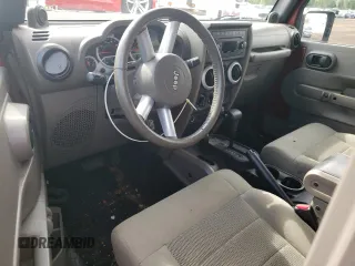 2008 Jeep Wrangler Sahara with VIN 1J4FA54178L566037, listed as a Copart auction lot 61439685 with 115,812 mi miles and Salvage title. Bid and sale history available at DreamBid. Image 8.