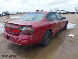 2003 Pontiac Bonneville SE with VIN 1G2HX52K334138157, listed as a IAAI auction lot 41897767 with 216,757 mi miles. Bid and sale history available at carsss.com. Image 4.