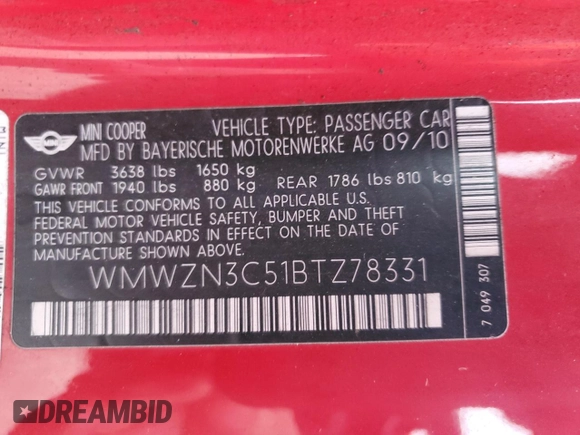 2011 MINI Convertible with VIN WMWZN3C51BTZ78331, listed as a Copart auction lot 73348304 with 94,219 mi miles and Salvage title. Bid and sale history available at DreamBid. Image 12.