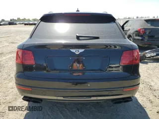 2020 Bentley Bentayga V8 z VIN SJAAM2ZV4LC029508, wystawiony jako Copart lot #53716675 z przebiegiem 19 869 mil mil oraz Szkody całkowita. Historia ofert i sprzedaży dostępna na DreamBid. Obrazek 6.