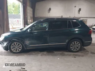 2018 Volkswagen Tiguan SEL with VIN 3VV2B7AX3JM133326, listed as a IAAI auction lot 42459190 with 94,665 mi miles and . Bid and sale history available at DreamBid. Image 14.