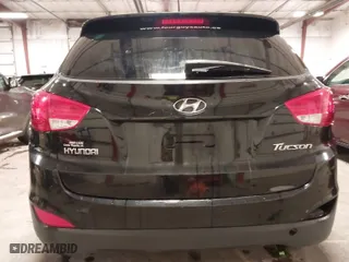 2013 Hyundai Tucson GLS with VIN KM8JU3AC0DU754948, listed as a IAAI auction lot 41811891 with 139,056 mi miles. Bid and sale history available at carsss.com. Image 21.