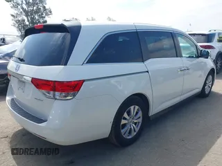 2016 Honda Odyssey SE with VIN 5FNRL5H33GB043303, listed as a IAAI auction lot 42215233 with 67,097 mi miles and . Bid and sale history available at DreamBid. Image 4.