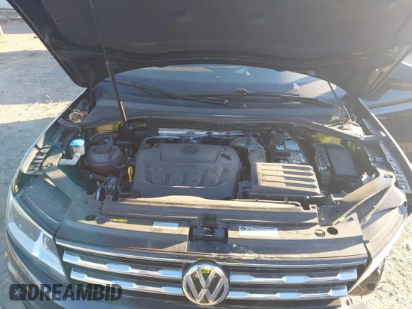 2018 Volkswagen Tiguan SEL with VIN 3VV3B7AX7JM117053, listed as a IAAI auction lot 40827695 with 71,489 mi miles and . Bid and sale history available at DreamBid. Image 10.