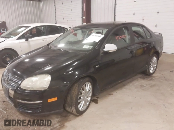 2008 Volkswagen Jetta z VIN 3VWRA71K58M183060, wystawiony jako IAAI lot #41700707 z przebiegiem 174 555 mil mil oraz . Historia ofert i sprzedaży dostępna na DreamBid. Obrazek 2.