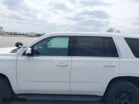 2020 Chevrolet Tahoe Commercial with VIN 1GNSKDEC9LR260983, listed as a IAAI auction lot 42062097 with 124,911 mi miles. Bid and sale history available at carsss.com. Image 14.
