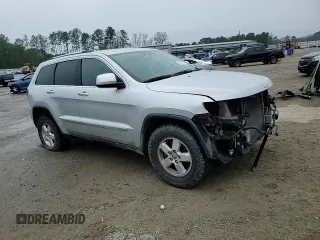 2012 Jeep Grand Cherokee Laredo with VIN 1C4RJFAG2CC294202, listed as a Copart auction lot 44918715 with 104,605 mi miles and Salvage Title. Bid and sale history available at carsss.com. Image 11.