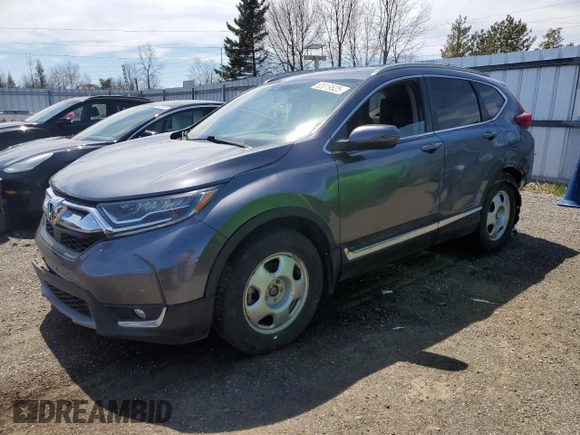2019 Honda CR-V Touring with VIN 2HKRW2H90KH149664, listed as a Copart auction lot 52019525 with 147,649 mi miles and Salvage Title. Bid and sale history available at DreamBid. Image 1.