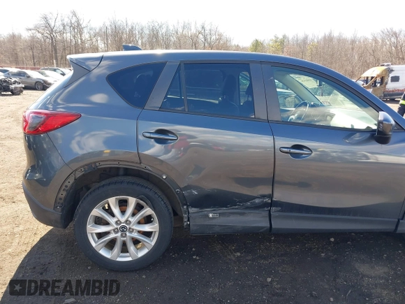 2013 Mazda CX-5 Grand Touring with VIN JM3KE4DE1D0164488, listed as a IAAI auction lot 41683326 with 129,989 mi miles. Bid and sale history available at carsss.com. Image 6.