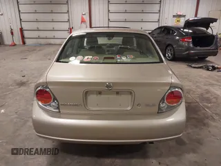 2002 Nissan Maxima GLE z VIN JN1DA31AX2T305310, wystawiony jako IAAI lot #42302521 z przebiegiem 68 920 mil mil oraz . Historia ofert i sprzedaży dostępna na DreamBid. Obrazek 16.