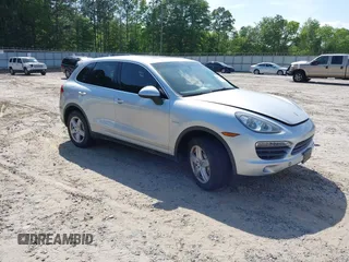 2012 Porsche Cayenne S Hybrid z VIN WP1AE2A20CLA92424, wystawiony jako IAAI lot #42315279 z przebiegiem 129 119 mil mil oraz . Historia ofert i sprzedaży dostępna na DreamBid. Obrazek 1.