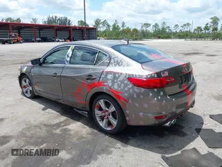 2013 Acura ILX Technology with VIN 19VDE1F70DE002429, listed as a IAAI auction lot 41921425 with 180,579 mi miles and . Bid and sale history available at DreamBid. Image 3.