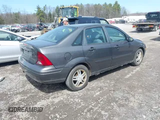 2004 Ford Focus SE with VIN 1FAFP34Z64W145178, listed as a IAAI auction lot 41962429 with 274,025 mi miles and . Bid and sale history available at DreamBid. Image 4.