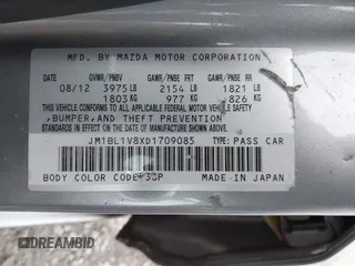 2013 Mazda 3 i Touring with VIN JM1BL1V8XD1709085, listed as a IAAI auction lot 41156266 with 149,911 mi miles and . Bid and sale history available at DreamBid. Image 9.