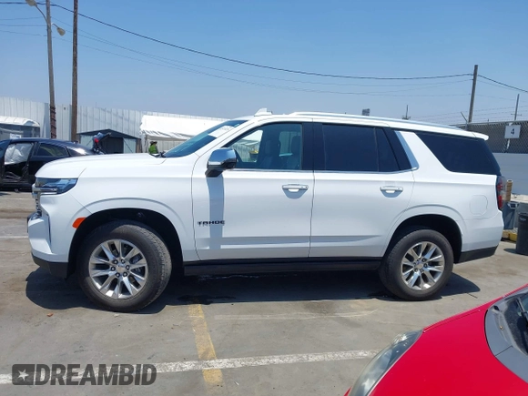 2023 Chevrolet Tahoe Premier with VIN 1GNSKSKD0PR262516, listed as a IAAI auction lot 42473875 with 83,461 mi miles and . Bid and sale history available at DreamBid. Image 14.
