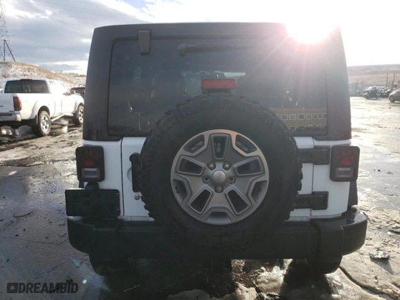 2015 Jeep Wrangler Unlimited Rubicon Hard Rock with VIN 1C4BJWFGXFL747383, listed as a Copart auction lot 42205665 with 55,128 mi miles and Salvage Title. Bid and sale history available at carsss.com. Image 6.