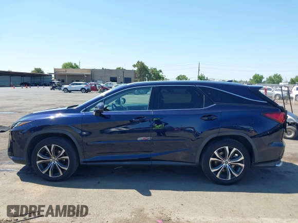 2018 Lexus RX 350L Premium with VIN JTJDZKCA4J2009035, listed as a IAAI auction lot 42636998 with 108,555 mi miles and . Bid and sale history available at DreamBid. Image 14.