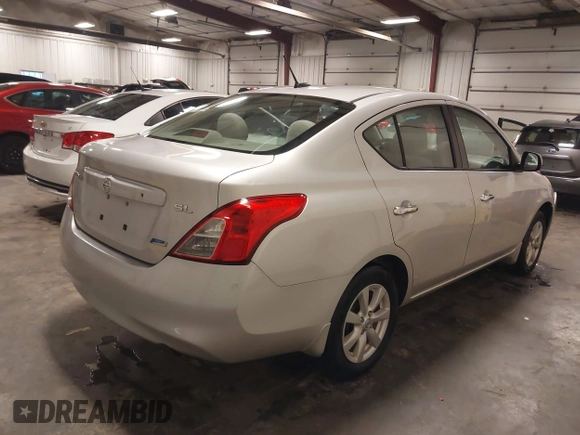 2012 Nissan Versa SV with VIN 3N1CN7AP2CL938479, listed as a IAAI auction lot 41918877 with 150,000 mi miles and . Bid and sale history available at DreamBid. Image 4.