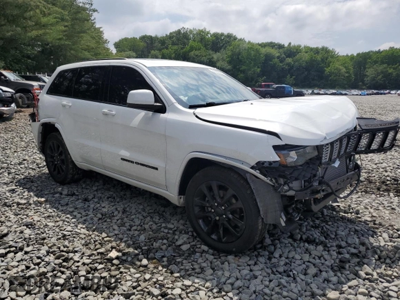 2018 Jeep Grand Cherokee Altitude with VIN 1C4RJFAGXJC122688, listed as a Copart auction lot 61290525 with 106,671 mi miles and Salvage title. Bid and sale history available at DreamBid. Image 4.