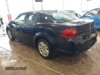 2012 Dodge Avenger SE with VIN 1C3CDZAB4CN111636, listed as a IAAI auction lot 41525179 with 202,779 mi miles. Bid and sale history available at carsss.com. Image 3.