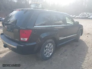 2009 Jeep Grand Cherokee Limited with VIN 1J8HR58T49C537818, listed as a IAAI auction lot 41845235 with 90,326 mi miles. Bid and sale history available at carsss.com. Image 4.