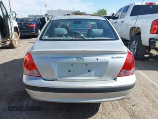 2004 Hyundai Elantra GLS z VIN KMHDN46D54U783394, wystawiony jako IAAI lot #42081704 z przebiegiem 186 301 mil mil oraz . Historia ofert i sprzedaży dostępna na DreamBid. Obrazek 16.