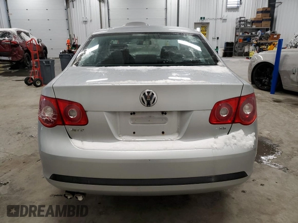 2006 Volkswagen Jetta z VIN 3VWRF31K86M618158, wystawiony jako Copart lot #42728175 z przebiegiem 117 433 mil mil oraz Czysty tytuł • Clean title. Historia ofert i sprzedaży dostępna na DreamBid. Obrazek 6.