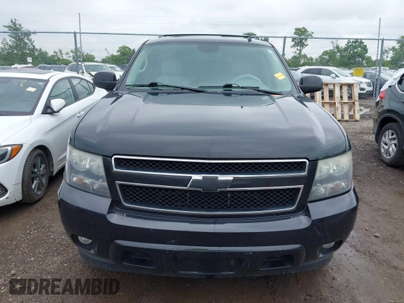 2011 Chevrolet Suburban with VIN 1GNWKMEG1BR374950, listed as a IAAI auction lot 42781182 with 304,690 mi miles and . Bid and sale history available at DreamBid. Image 12.